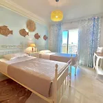 Apartment Exclusive Beachfront Moments - Sea View Balcony, Private Garage, Wifi, Ac